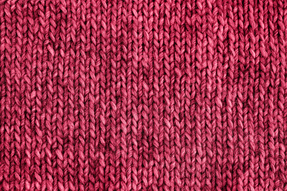 Örme kumaşın ilmek yapısının makro çekimi, esnek triko yüzey detayı